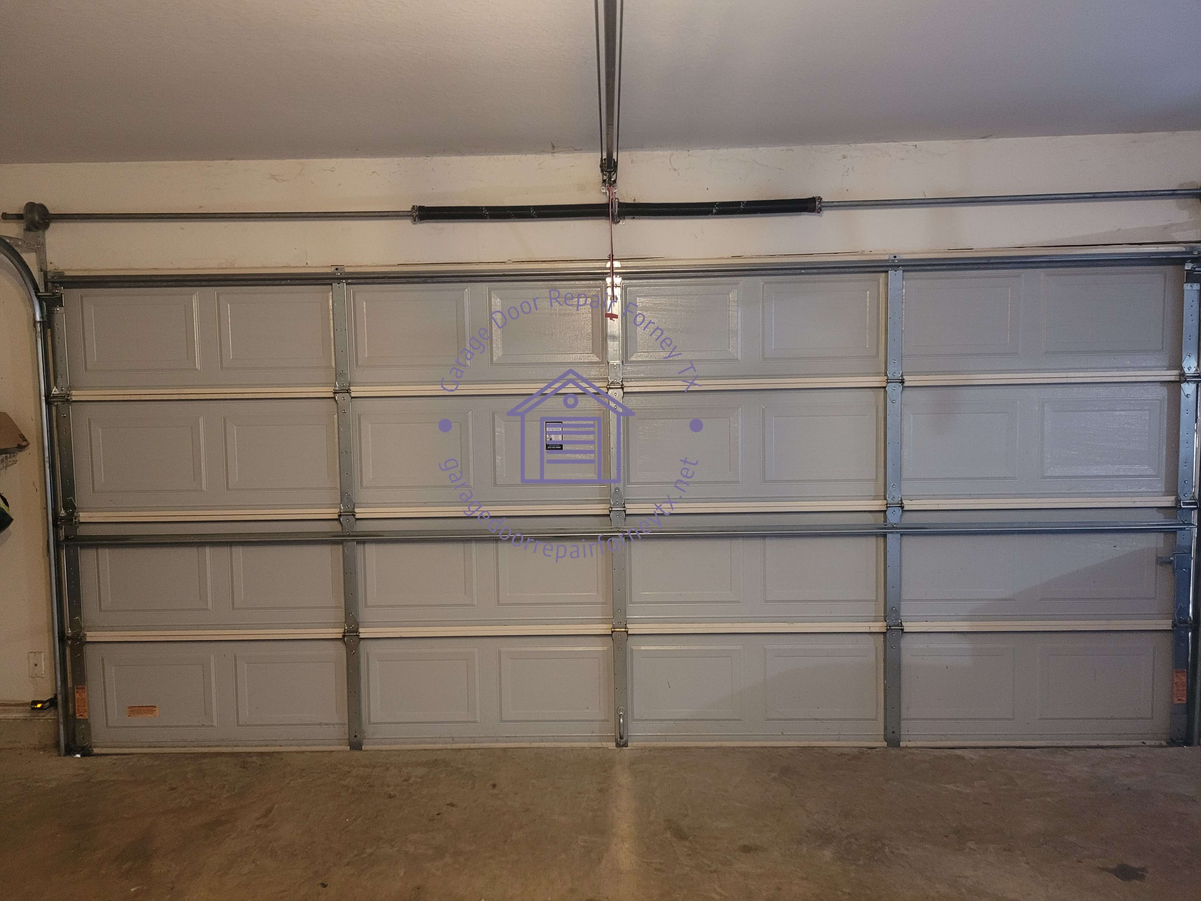 garagedoorrepairforneytx.net_new_springs_installation